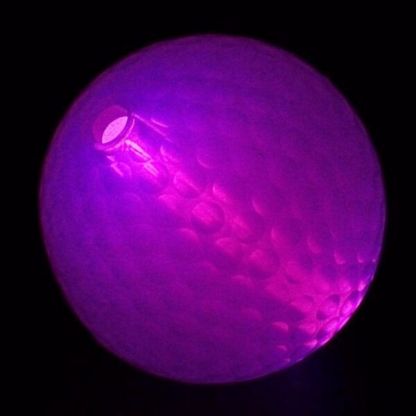 A purple ball with a light in it