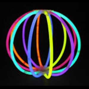A neon ball is shown in the dark.
