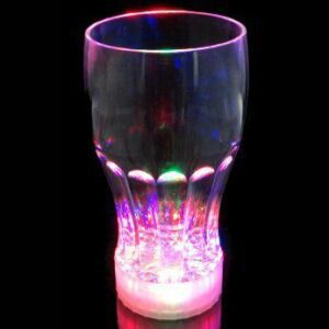 A close up of a glass with lights on it