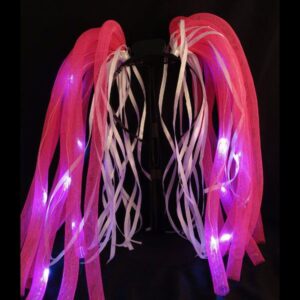 A pair of pink and white light up hair clips.