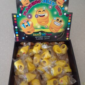 A box of yellow candy with a carton of candies in front.