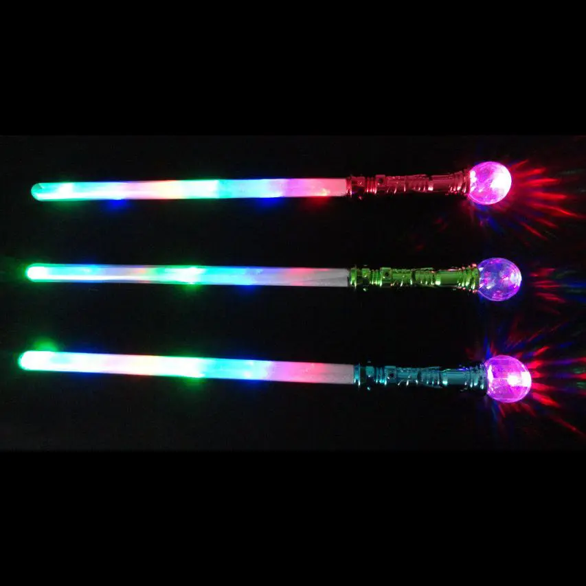 A group of three light up sticks with different colors.