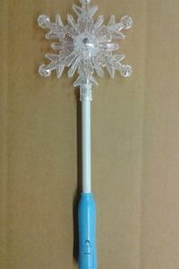 A toothbrush with a blue handle and a white snowflake.