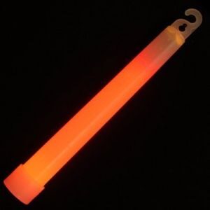 A red light stick is lit up on the dark background.