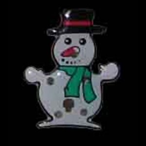 A snowman with a black hat and green scarf.