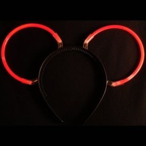 A mickey mouse headband with red lights on it.