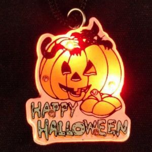 A lighted happy halloween pumpkin ornament.