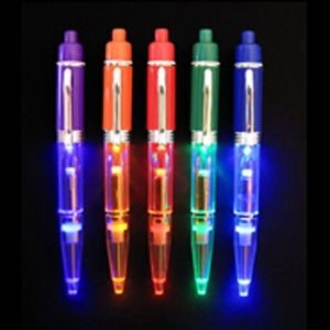 A group of five pens with lights on them.