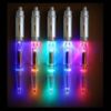 A group of five electronic cigarettes with lights on them.