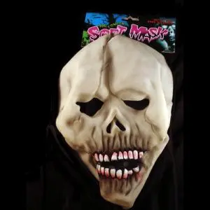 A skull mask is shown in front of a black background.