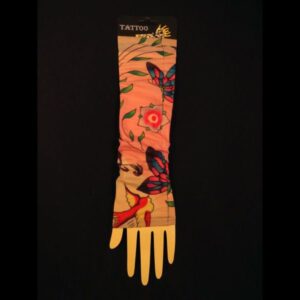 A pink and black tattoo print glove with a wooden handle.