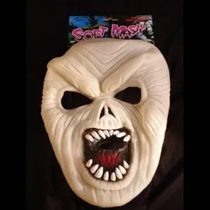 A white mask with teeth and mouth open.