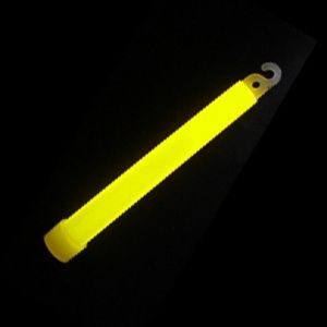 A yellow stick of tape on a black background